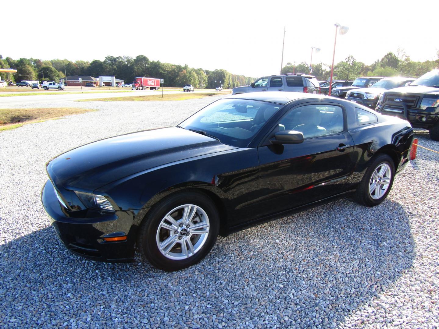 2014 Black Ford Mustang V6 Coupe (1ZVBP8AM2E5) with an 3.7L V6 DOHC 24V engine, Automatic transmission, located at 15016 S Hwy 231, Midland City, AL, 36350, (334) 983-3001, 31.306210, -85.495277 - Photo#2